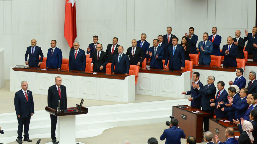 Turkey's President Recep Tayyip Erdogan receives his oath as he is sworns as Turkey's first Executive President at the Turkish parliament on July 9, 2018 in Ankara, Turkey. President Erdogan was sworn in during a parliamentary meeting and later an inauguration ceremony attended by a number of foreign leaders and dignitaries. President Erdogan secured another five year term and increased powers after winning 52.5 percent of the vote in the June 24 snap presidential and parliamentary elections. Under the new 